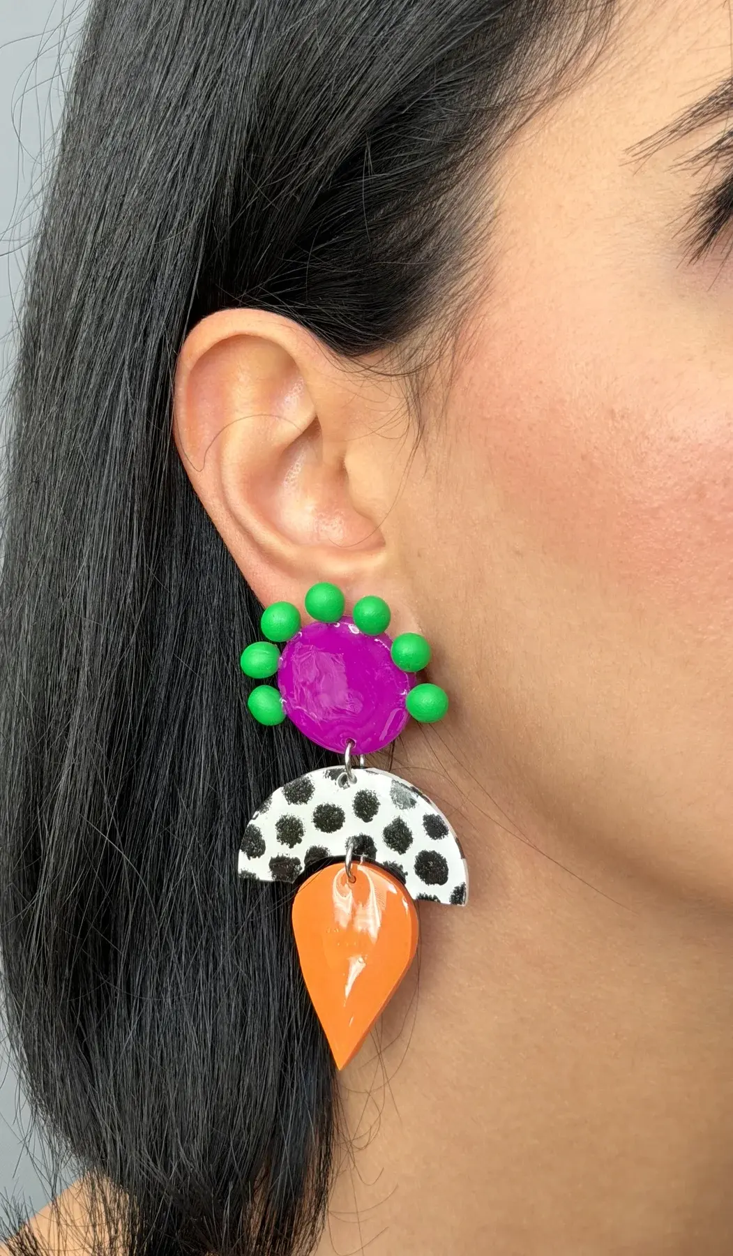 Dot worn on an ear